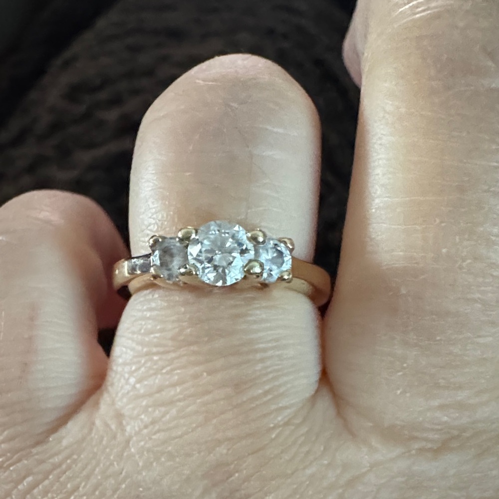 Elegant Gold 14 K engagement Women's Ring with 3 natural diamonds.Helzberg
